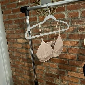 A comfy style beige bralette from urban outfitters